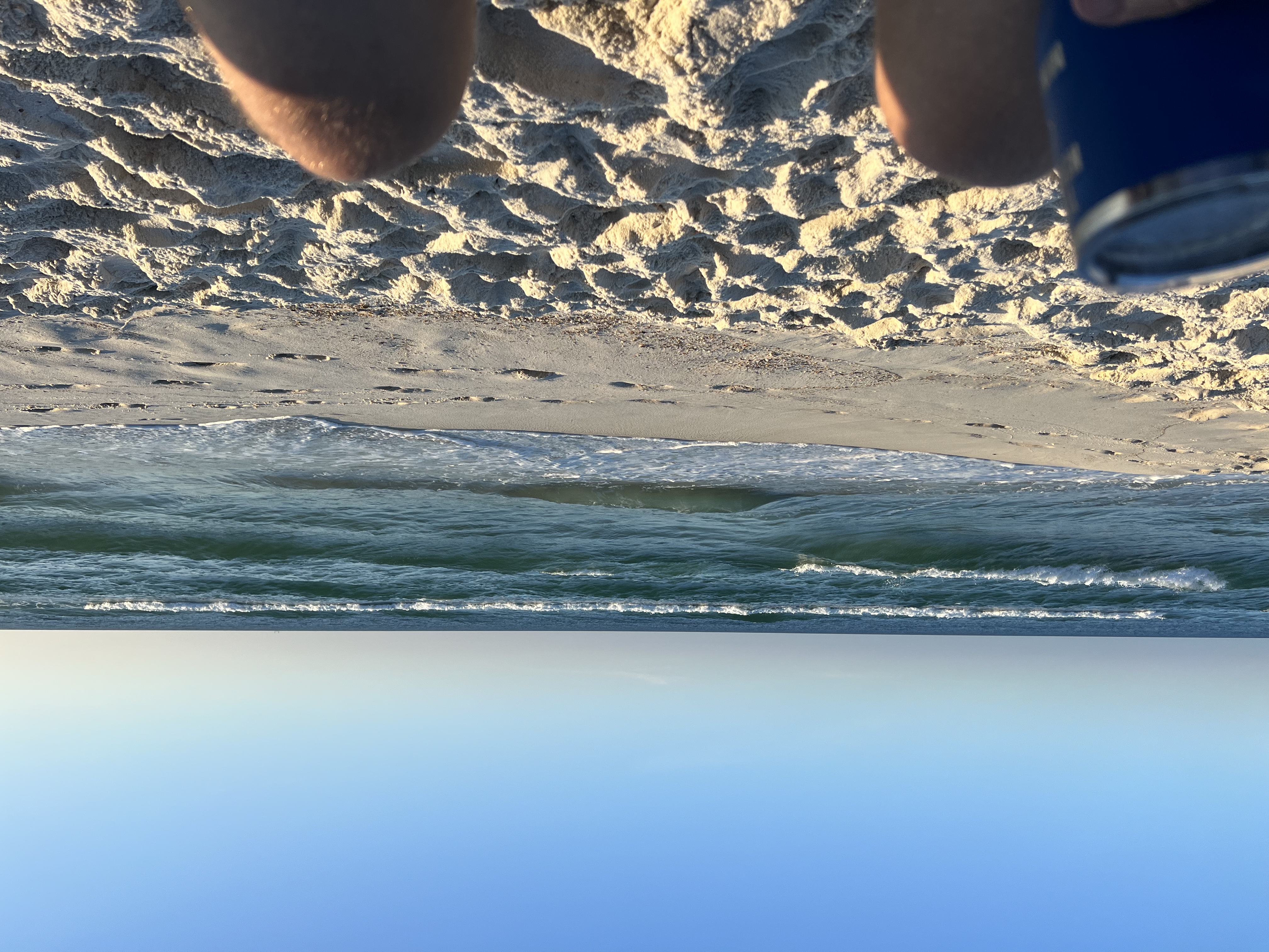 Love relaxing with my feet in the sand at Orange Beach