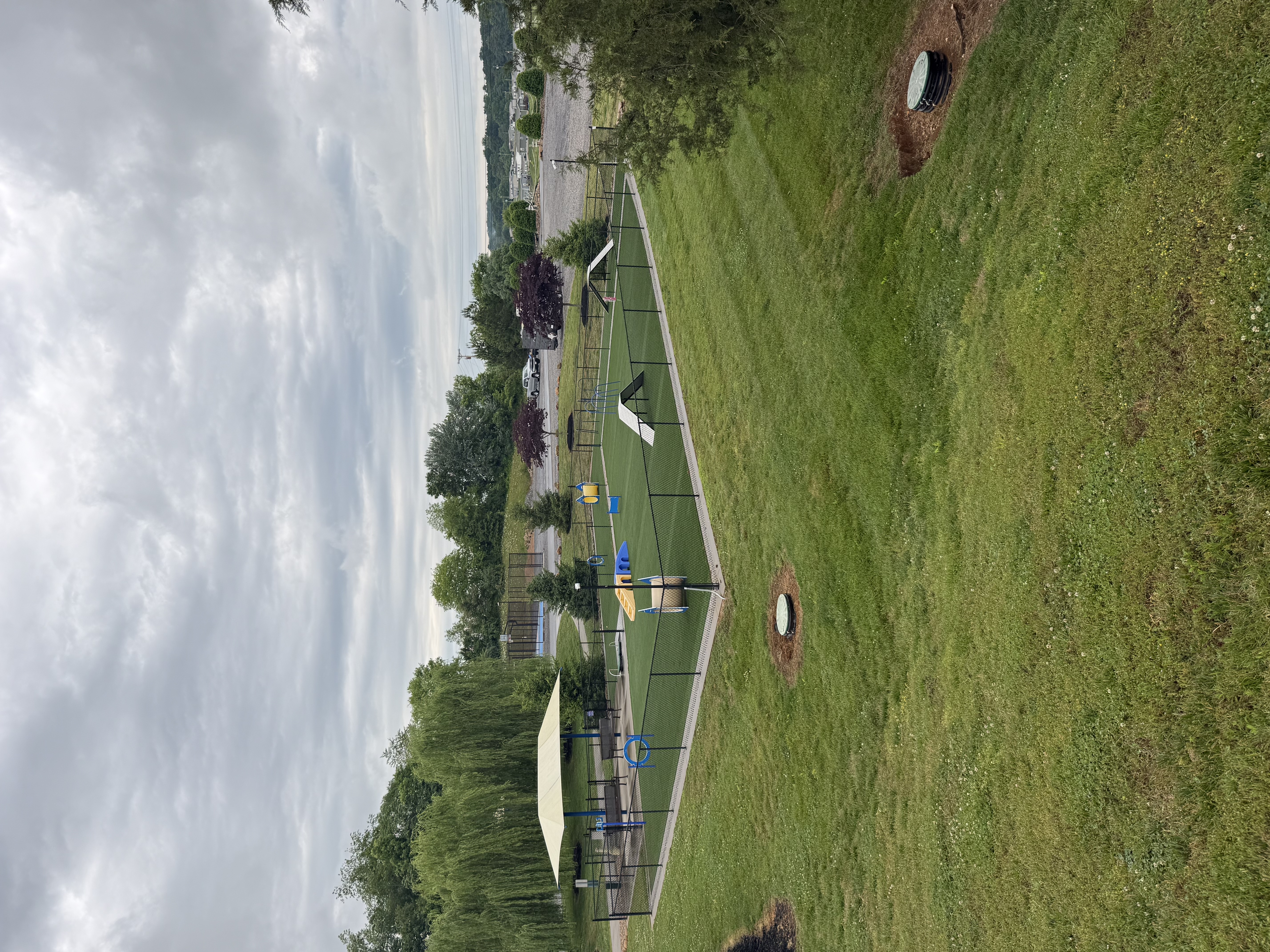 View of dog park at Anchor Down RV Resort from a distance